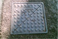 Manhole Diagonally Split Square Pattern Name Top Left 'Exeter' not central